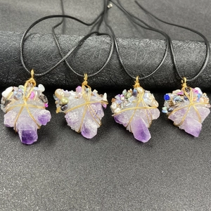 Handmade amethyst druzy wire wrapped pendants with pearl accents on black cord