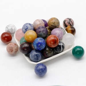 Polished 20mm natural stone spheres including amethyst and agate in a white ceramic bowl