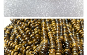Primer plano de cuentas ojo de tigre en forma de rueda marrón dorado para joyería
