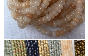 Vista macro de cuentas de ojo de tigre y jaspe para accesorios de joyería DIY