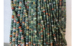Macro shot of natural bloodstone abacus beads for DIY jewelry making and bracelet crafts