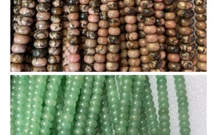 Macro shot of natural stone abacus beads in pink and green for DIY jewelry making