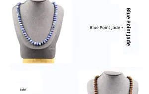 Detail of handcrafted natural blue point jade and assorted stone beaded necklaces