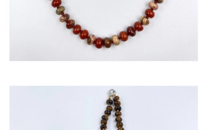 Detailed view of natural tiger eye and red jasper stone beads with woven cord and metal clasp