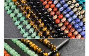 Macro detail of natural stone beads necklace with multi-color aventurine and agate