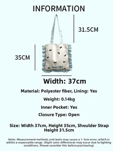 Blue striped tote bag detail with ruffles and interior pocket measurements