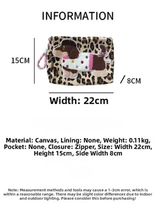 Detailed view of leopard print canvas bag with embroidered dachshund and size specifications