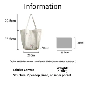 Detailed dimensions of a white canvas tote bag with red embroidered dog and text