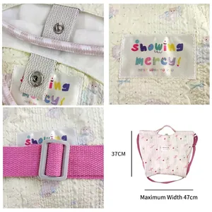 Quilted canvas shoulder bag with cute animal patterns and adjustable strap, 37x47cm dimensions