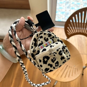 Mini leopard print earphone bag with braided strap and heart zipper detail