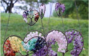 Outdoor hanging tree of life pendants with heart wire frames and natural crystal stones