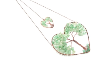 Detailed wire-wrapped heart-shaped Tree of Life pendant with natural green stones