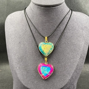 Bohemian heart-shaped imperial stone pendants with gold-plated edges on a black cord