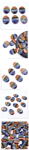 Polished oval seven chakra healing stones with colorful layered stripes for meditation