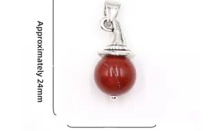 Macro detail of red gemstone witch hat pendant with size measurement of approx. 24mm