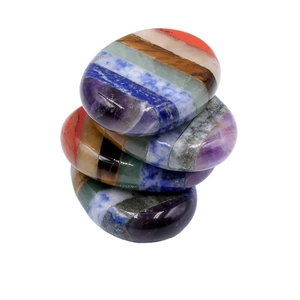 Set of four polished natural 7 chakra stones for meditation and yoga healing