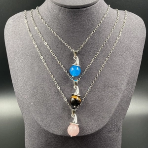 Wizard hat crystal ball pendant necklaces in rose quartz, tiger eye, and blue agate