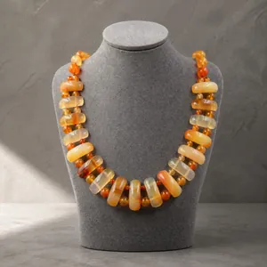 Detail view of natural carnelian beaded necklace with rectangular and round stones