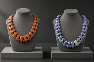 Detail of blue point jade and goldstone beaded necklaces with trapezoid stone plates