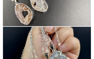 Macro shot of silver plated natural Brazilian agate slice pendant with heart shaped center