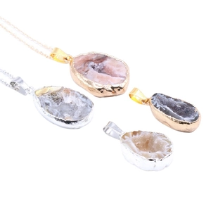 Natural Brazilian geode agate pendant necklaces with gold plated edges on white background