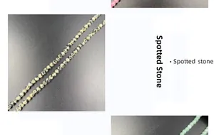 Detailed macro view of 4mm polished Dalmatian Jasper round beads for DIY jewelry making