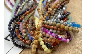 Macro shot of 4mm-8mm colorful natural gemstone beads for DIY jewelry making