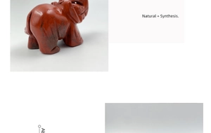 Detail van rode stenen olifant met natuurlijke texturen en synthetisch materiaal