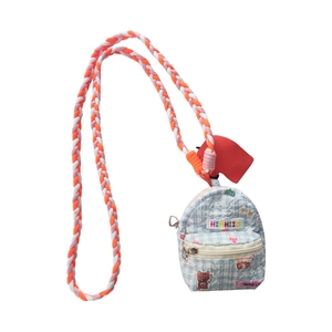 Mini backpack style crossbody earphone bag with blue checkered fabric and woven strap