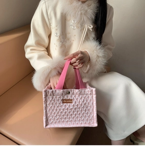 Pink insulated picnic lunch bag with Star-picking leather tag and textured fabric