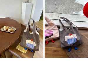 Detail of canvas tote bags with cute cartoon cake and donut prints and 3D plush legs