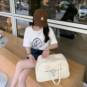 Minimalist beige canvas boston bag with letter print and large capacity for travel