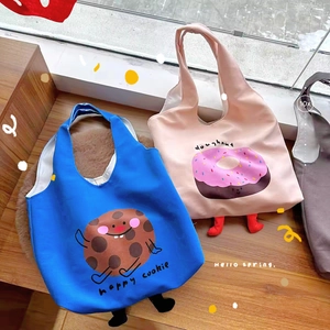 Cute canvas tote bags with cartoon cookie and doughnut designs featuring 3D plush doll feet