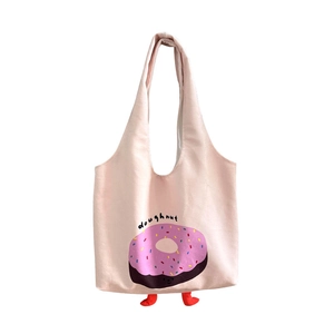 Cute pink canvas tote bag featuring a doughnut print and 3D plush legs decoration
