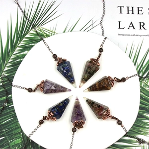 Set of seven natural crystal resin hexagonal cone pendulums for healing meditation