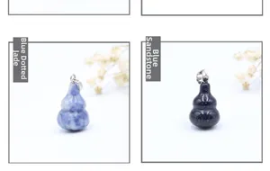 Detail view of Blue Spot Jade and Blue Sandstone stone pendants in gourd shape