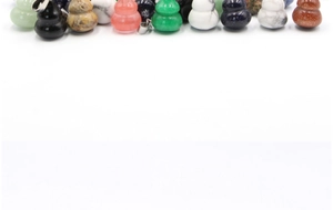 Detailed collection of assorted natural stone gourd pendants with silver metal loops
