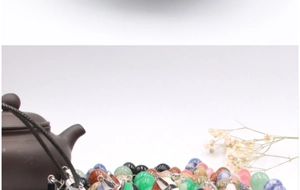 Polished natural stone gourd pendants in various colors with silver metal clasps