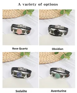 Detail of woven leather bracelets with rose quartz and obsidian stones with bells