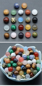 Macro shot of assorted 8mm natural stone round beads in a petal-shaped porcelain bowl