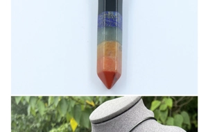 Detailed close-up of a hexagonal crystal pendant with multi-colored natural stone layers