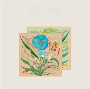 Dual-sided floral silk scarf with vibrant orange and green botanical print patterns