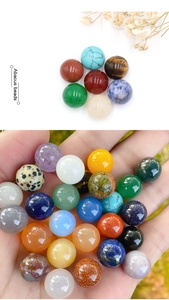 Close-up of 12mm polished assorted gemstone round beads for DIY jewelry making