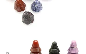 Macro detail of miniature Christmas trees carved from diverse natural crystal stones