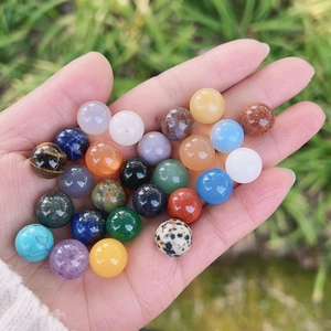 Polished 12mm mini crystal stone spheres set with natural amethyst and tiger eye gems