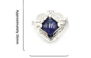 Detailed view of silver angel wing heart locket pendant with blue stone, height 26mm