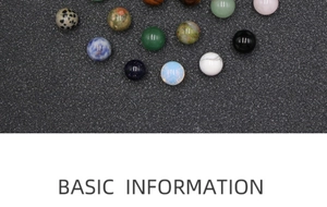 Macro view of assorted 10mm polished natural gemstones including aventurine and obsidian