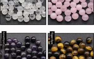 Macro view of polished 10mm amethyst, tiger eye, rose quartz and clear quartz stone beads