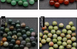 Detail view of assorted 10mm polished natural stones including Indian Agate and Unakite
