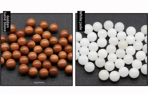 Macro detail comparing synthetic Goldstone beads and polished natural White Jade stones